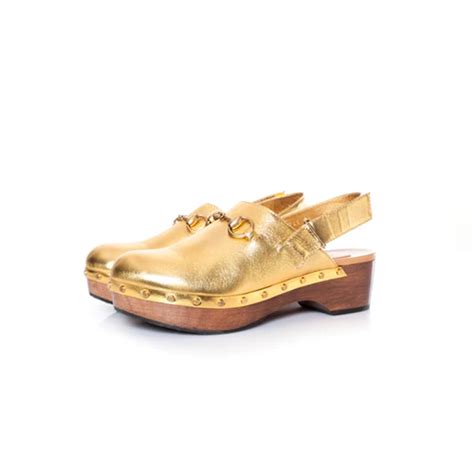 Leather mules & clogs Gucci Gold size 39.5 EU in Leather